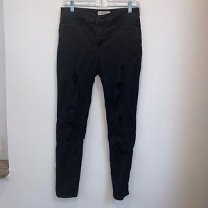 Black ripped PacSun skinny jeggings